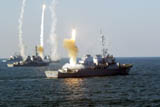 Arleigh Burke Class destroyers let rip with missiles.
